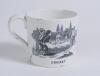 &lsquo;Cricket&rsquo; and &lsquo;Leap Frog&rsquo;. Victorian Staffordshire cricket mug with strap handle, transfer printed in black with images of an early cricket scene with boys playing cricket with title &lsquo;cricket&rsquo; below and to the other side a scene of boys playing Leap Frog 