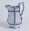 Cricket jug. A light blue mid 19th century Staffordshire salt-glaze jug, the hexagonal bulbous body divided into six panels with cricketers wearing top hats, being Pilch, Clarke and Box. The panels nicely highlighted in a darker cobalt blue. Above and bel