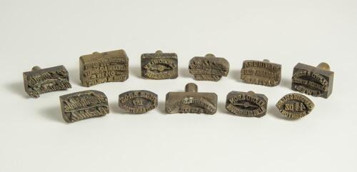 Cricket ball dyes/stamps. Interesting and unusual collection of eleven cricket ball brass metal dye stamps for stamping makers details onto cricket balls, normally in gold. The makers names include &lsquo;Dark & Sons, Lord&rsquo;s Ground, London&rsquo;, &lsquo;E.H. Bowley of Win