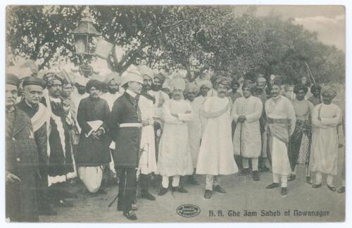 Kumar Shri Ranjitsinhji. Cambridge University, Sussex, London County & England 1893-1920. Early mono printed postcard of Ranji standing amongst a group of Indian dignitaries and others in traditional costume with a British army officer. Date unknown, poss
