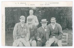 Kumar Shri Ranjitsinhji. Cambridge University, Sussex, London County & England 1893-1920. Mono printed postcard of a group featuring Ranjitsinghji, W.G. Grace, G.W. Beldam and &lsquo;Capt. Hoare&rsquo;. Beldam and Ranji are sitting on the knee of Grace and Hoare resp