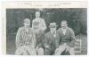 Kumar Shri Ranjitsinhji. Cambridge University, Sussex, London County & England 1893-1920. Mono printed postcard of a group featuring Ranjitsinghji, W.G. Grace, G.W. Beldam and &lsquo;Capt. Hoare&rsquo;. Beldam and Ranji are sitting on the knee of Grace and Hoare resp