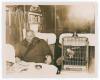 Kumar Shri Ranjitsinhji. Cambridge University, Sussex, London County & England 1893-1920. Original sepia press photograph of Ranji in later years, seated on a train at Victoria before leaving England for India on 24th December 1932 for the final time. Ran