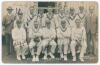 &lsquo;Sussex Team 1926&rsquo;. Original sepia real photograph postcard of the Sussex team for the drawn match v Kent at Tonbridge, 16th- 18th June 1926. The players seated and standing in rows wearing cricket attire. Fully signed in ink to the photograph by all twel
