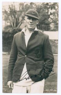George Cox Junior. Sussex 1931-1961. Mono real photograph postcard of Cox, three quarter length, wearing Sussex cap and blazer. Very nicely signed in black ink &lsquo;George Cox&rsquo;. Printed title &lsquo;Geo Cox Jnr&rsquo;. Deane, Wiles & Millar of Brighton. Postally unused. 
