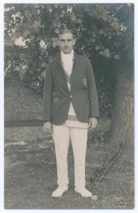 Albert John Holmes. Sussex 1922-1939. Mono real photograph postcard of Holmes standing full length in cricket attire and blazer. Nicely signed in black ink to the photograph &lsquo;A.J. Holmes&rsquo;. Official stamp to verso for Nias of Brighton. Postally unused. Ver