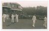 Sussex 1952. Mono real photograph plain back candid style postcard of the Sussex team entering the field of play from the pavilion with spectators looking on, for the match v Lancashire at Blackpool, 6th- 8th August 1952. The photograph signed in ink and 