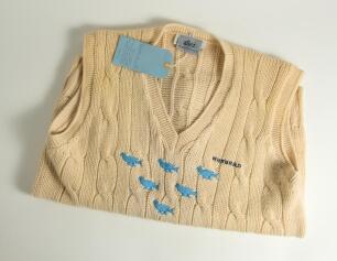 Allan Peter Wells. Sussex, Kent & England 1981-2000. Sussex sleeveless sweater, by Allez, worn by Wells in the 1992 cricket season. The sweater with Sussex emblem of the six blue martlets and sponsors logo &lsquo;Whitbread&rsquo; to front. Odd stain to front otherwis
