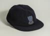 Stuart James Storey. Surrey and Sussex 1960-1978. Sussex navy blue 1st XI cloth cricket cap worn by Storey during his playing career. The cap,embroidered with the six martlet&rsquo;s emblem of Sussex to front. Name handwritten to inner label. Sold with a signed