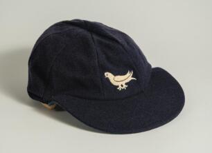 Dermot Alexander Reeve. Sussex, Warwickshire & England 1983-1996. Sussex navy blue 2nd XI cloth cricket cap worn by Reeve during his career. The cap embroidered with the single martlet emblem of Sussex. Previously sold by Knights as lot 325 in September 1