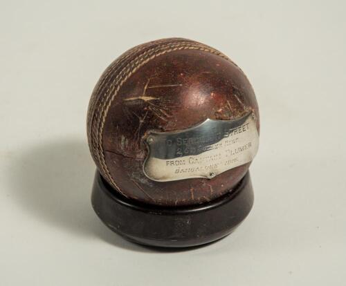 George Benjamin Street, Sussex & England 1909-1923. Cricket ball presented to George Street in 1916. The ball has two silver plaques attached to it with the following inscriptions, &lsquo;Sergeant Street. 2/6th Sussex Regiment. From Captain Plumer. Bangalore 19