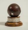 Maurice William Tate. Sussex & England 1912-1937. Cricket ball mounted to wooden stand with silver plaque running around the base of the stand with the inscription &lsquo;Scarborough&rsquo;s 48th Cricket Festival 1928. President Sir William Middlebrook. J.P. H.D.G. 