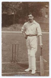 Claude Percival Buckenham. Essex & England 1899-1914. Early original sepia real photograph postcard of Buckenham standing full length at the wicket leaning on his bat. Signed in black ink to lower corner &lsquo;Buckenham&rsquo;, the signature a little faded. Blind em
