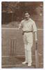 Claude Percival Buckenham. Essex & England 1899-1914. Early original sepia real photograph postcard of Buckenham standing full length at the wicket leaning on his bat. Signed in black ink to lower corner &lsquo;Buckenham&rsquo;, the signature a little faded. Blind em
