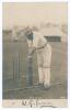 William Gilbert Grace. Gloucestershire, London County & England 1870-1908. Early original sepia real photograph postcard of Grace, full length in batting pose at the crease, wearing hooped cap. Very nicely signed in black ink by Grace to the lower margin.