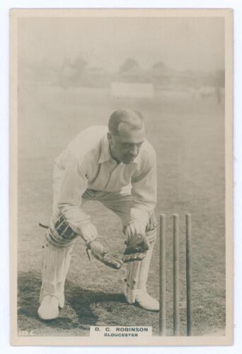 Douglas Charles Robinson. Gloucestershire & Essex 1905-1926. Phillips &lsquo;Pinnace&rsquo; premium issue cabinet size sepia real photograph trade card of Robinson, full length in wicket-keeping pose at the wicket. No. 135.C. Title &lsquo;D.C. Robinson. Gloucester&rsquo;. 4&rdquo;x6&rdquo;.