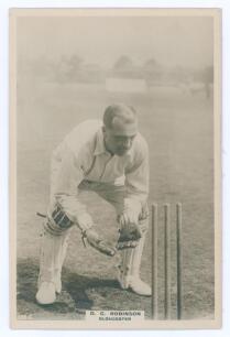 Douglas Charles Robinson. Gloucestershire & Essex 1905-1926. Phillips &lsquo;Pinnace&rsquo; premium issue cabinet size sepia real photograph trade card of Robinson, full length in wicket-keeping pose at the wicket. No. 135.C. Title &lsquo;D.C. Robinson. Gloucester&rsquo;. 4&rdquo;x6&rdquo;.