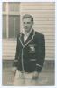 Douglas Vivian Parson Wright. Kent & England 1932-1957. Mono real photograph plain back postcard of Wright three quarter length in cricket attire and wearing M.C.C. tour blazer for the 1946/47 tour to Australia. Nicely signed in blue ink to the photograph