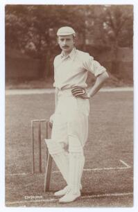 Eric William Mann. Kent & Cambridge University 1902-1905. Rare and early original sepia real photograph postcard of Mann standing full length at the wicket leaning on his bat, wearing Cambridge University cap. Printed title &lsquo;E.W. Mann&rsquo;. Blind embossed sta