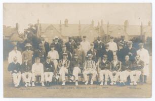 &lsquo;Northants and West Indians. August 1906&rsquo;. Early and rare original sepia real photograph postcard of the two teams seated and standing in rows wearing cricket attire for the match at Northampton 16th- 18th August 1906. West Indians (297 & 99) beat Northam