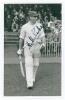 Arthur Mitchell. Yorkshire & England 1922-1945. Mono real photograph plain back postcard of Mitchell, full length walking out to bat wearing Yorkshire cap. Very nicely signed in ink by Mitchell. Date annotated to verso 1936. Appears to be by A. Wilkes & S
