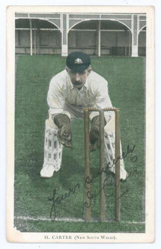 Hanson &lsquo;Sammy&rsquo; Carter, New South Wales & Australia, 1897-1925. Tinted colour printed postcard of Carter, full length, in wicket-keeping pose wearing Australian cap at Lord&rsquo;s during the Australian tour of England in 1909. Nicely signed in black ink by Cart