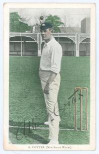 Albert &lsquo;Tibby&rsquo; Cotter. New South Wales & Australia 1901-1914. Mono postcard highlighted in green of Cotter standing full length in bowling pose at the wicket, wearing Australian touring cap, with caption to lower border &lsquo;A. Cotter (The Australian Cricket 