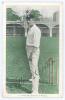 Albert &lsquo;Tibby&rsquo; Cotter. New South Wales & Australia 1901-1914. Mono postcard highlighted in green of Cotter standing full length in bowling pose at the wicket, wearing Australian touring cap, with caption to lower border &lsquo;A. Cotter (The Australian Cricket 