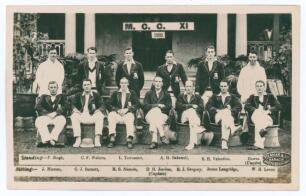 M.C.C. tour to India 1933/34. &lsquo;M.C.C. XI 1933&rsquo;. Original sepia real photograph postcard of the M.C.C. team and officials seated and standing in rows wearing tour blazers. Printed title and players&rsquo; names to borders. Players are Jardine (Captain), Human, B