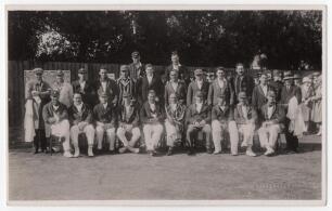 A.E.R. Gilligan&rsquo;s XI v Hon. L.H. Tennyson&rsquo;s XI 1925. Original mono real photograph postcard of the two teams seated and standing together in rows wearing cricket attire and assorted blazers for the drawn match played at Folkestone 9th- 11th September 1925