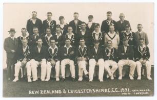 New Zealand tour to England 1931. &lsquo;New Zealand & Leicestershire C.C.C. 1931&rsquo;. Original mono real photograph postcard of the two teams seated and standing in rows wearing cricket attire and blazers for the drawn tour match played at Leicester 9th- 11th May