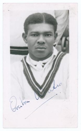 Everton de Courcy Weekes. Barbados & West Indies 1944-1964. Mono real photograph plain back postcard of Weekes, head and shoulders wearing cricket attire. Nicely signed in blue ink to the photograph by Weekes. Annotation in ink to verso &lsquo;Autographed 31st 
