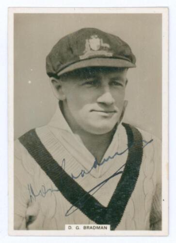 Donald George Bradman. New South Wales, South Australia & Australia 1927-1949. Mono &lsquo;photocard&rsquo; of Don Bradman, Australia&rsquo;s Captain from the 1938 series of Test matches in England. Published by Ardath Tobacco Co and packed with Kings cigarettes. Signed by