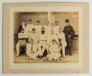 South v North 1893. Large early original sepia photograph of the South team, standing and seated in rows, wearing caps and cricket attire, in front of the pavilion at Hastings for the Festival match played 11th- 13th September 1893. Players featured are W