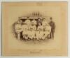 &lsquo;Gloucestershire. Brighton Match, June 19th, 20th, 21st, 1884&rsquo;. Early large original sepia photograph of the Gloucestershire team for the match played v Sussex at Hove, the players seated and standing in rows wearing cricket attire. Printed title and play