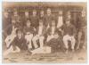 Australian tour to England 1888. Original early sepia photograph of the Australian team for the tour match v Surrey at Kennington Oval, 14th & 15th May 1888. The players and officials seated and standing in rows wearing tour blazers, some in caps. Players