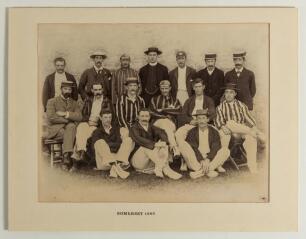 Somerset C.C.C. c.1893. Large early original mono photograph of the Somerset team seated and standing in rows wearing cricket attire and assorted caps and blazers. Players are Hewett (Captain), Newton, Hedley, Woods, Challen, Nichols, Dunlop, Hill, G. Woo