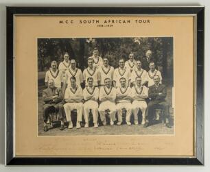 &lsquo;M.C.C. South African Tour 1938-1939&rsquo;. Official black and white photograph of the M.C.C. team who toured South Africa in 1938/39, seated and standing in rows and wearing M.C.C. sweaters. The photograph is laid down to official photographers mount. Nicely 