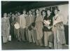 Pakistan inaugural tour to England 1954. Six original sepia press photographs from the 1954 tour. One depicts the team being welcomed on board ship on arrival at Southampton, signed in ink by seven players including Waqar Hasan, Khalid Hasan, Shuja-ud-din - 3