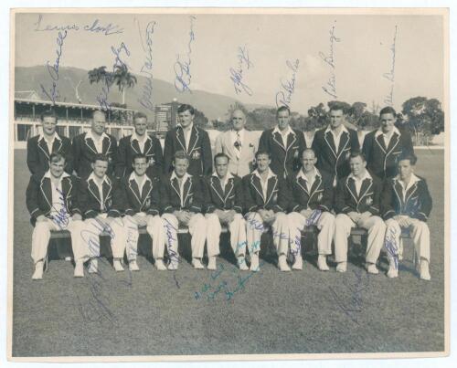 Australia tour to West Indies 1954/55. Official mono photograph of the Australian touring party seated and standing in rows wearing tour blazers. The photograph is fully signed in ink by all seventeen featured members of the touring party and one other, e