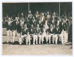 England v India, The Oval 1936. Original mono press photograph of the two teams together for the 3rd Test, 15th- 18th August 1936, in front of the pavilion with crowds looking on. The players seated and standing in rows wearing cricket attire and blazers.