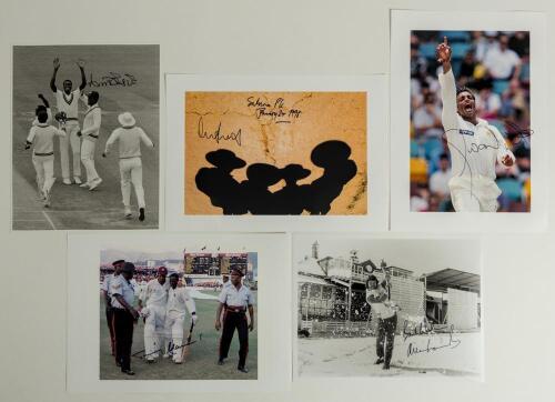 International cricket 1988-2007. A mixed bag of sixteen mono and colour press photographs including some good images, some signed. Subjects include Curtley Ambrose celebrating taking a wicket for West Indies against England at Old Trafford 1988, signed by