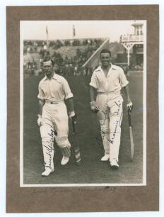 M.C.C. Australian Touring Team v C.I. Thornton&rsquo;s XI, Scarborough 1928. Original mono photograph of Ernest Tyldesley (Lancashire) and Maurice Tate (Sussex) walking out to bat for M.C.C. at Scarborough with crowds in the stands in the background, for the ma