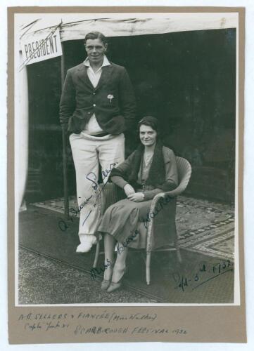 Arthur Brian Sellers. Yorkshire 1932-1948. Original mono photograph of Sellers standing full length wearing cricket attire and Yorkshire blazer with his fianc&eacute;, Miss Bessie Walker, seated beside. The couple are situated in front of the President&rsquo;s tent at