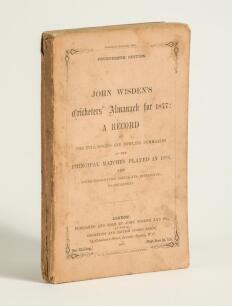 Wisden Cricketers&rsquo; Almanack 1877. 14th edition. Original paper wrappers. Some soiling and minor wear to wrappers and spine paper, slight loss to spine paper at the head and the base, soiling to page block edges otherwise in good/very good condition. Pages