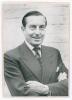 Henry Cotton. Original mono photograph of Cotton, head and shoulders wearing suit and tie. Signed in black ink &lsquo;Henry Cotton&rsquo;. The photograph probably taken in the 1940s. Photographer unknown. 5.5&rdquo;x8&rdquo; laid to trimmed card. Very good condition. - 2