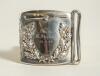 Cricket belt buckle. Silver metal cricket belt buckle of almost square form with laurel wreath garland to centre and cricket bat and ball above. Inscription to centre reads &lsquo;Won by M. Shephard&rsquo;. 14.4. [18]65. Approximately 2.5&rdquo;x2.25&rdquo;. Good condition