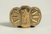 Cricket belt buckle. An attractive brass cricket belt buckle of oblong form with centre figure of a raised batsman playing a shot, to both sides are decorative cricket bats and balls in vertical patterns with floral design. Makers and registration mark to