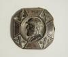 &lsquo;The Champion&rsquo;. Early brass cricket belt buckle of square form with rounded corner with head and shoulders image of a bearded cricketer wearing a bowler style hat with the legend &lsquo;The Champion&rsquo; to the hat band. The image of the cricketer at the centre of 