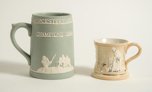 Cricket mugs/tankards. Small Staffordshire 3&rdquo; waisted cricket mug with strap handle and beaded rim, with cream background and three raised figures in white of a batsman, bowler and wicket keeper, believed to be Lillywhite, Pilch and Box. c1870. Silver lus